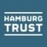 Das Logo der Hamburg Trust Grundvermögen und Anlage GmbH